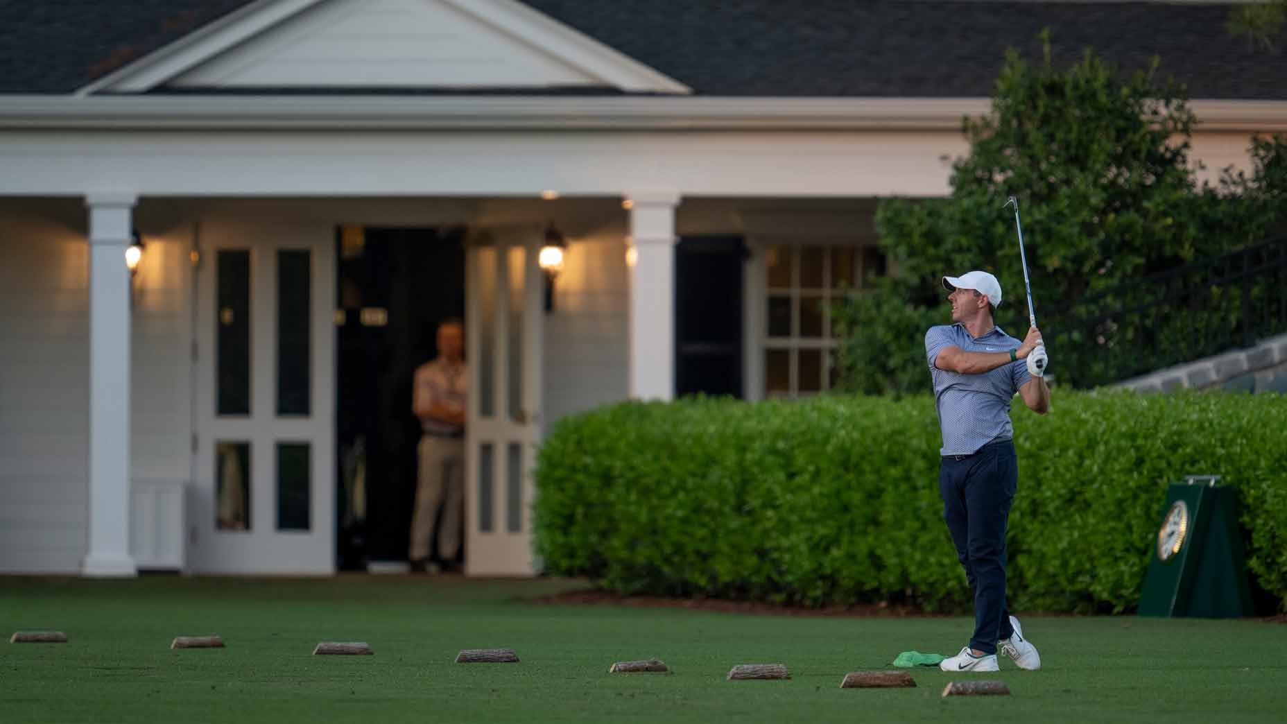 Rory McIlroy hits balls on the range after Saturday's third round of the 2026 Masters