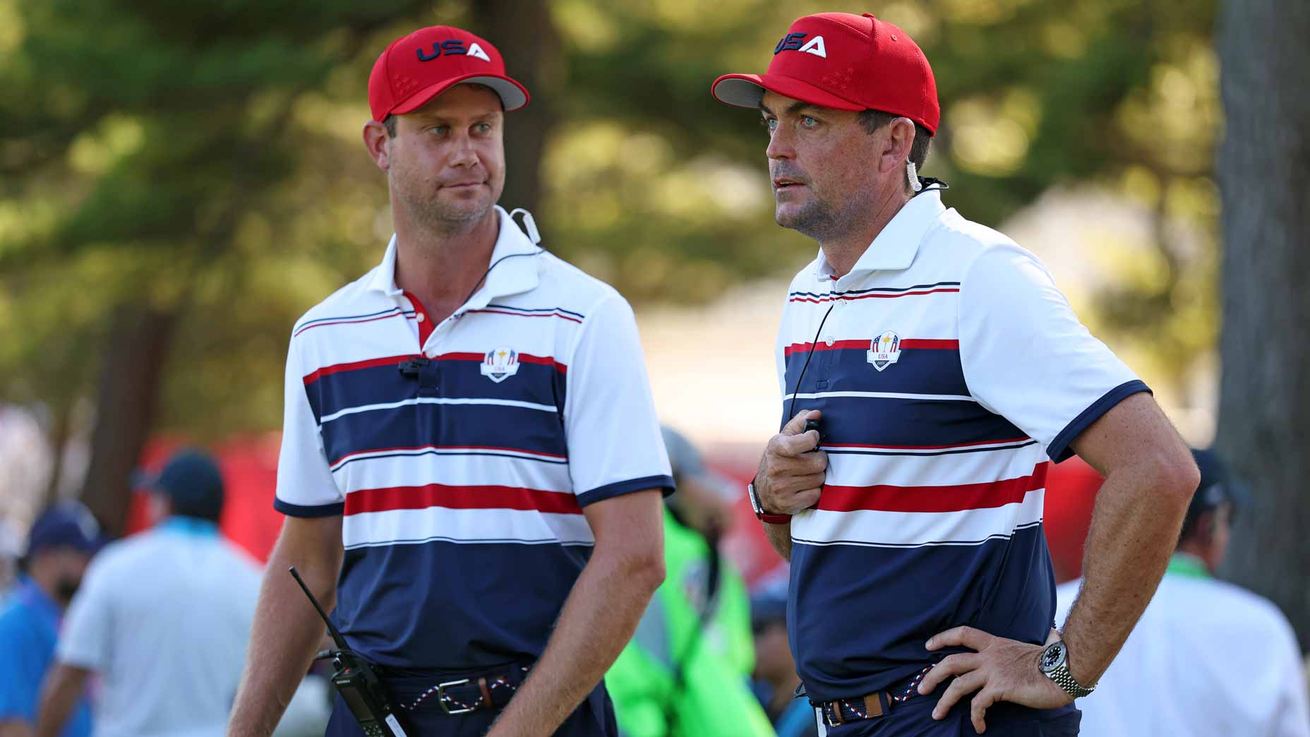 Harris English and U.S. Captain Keegan Bradley watch Sunday singles matches at the 2025 Ryder Cup.