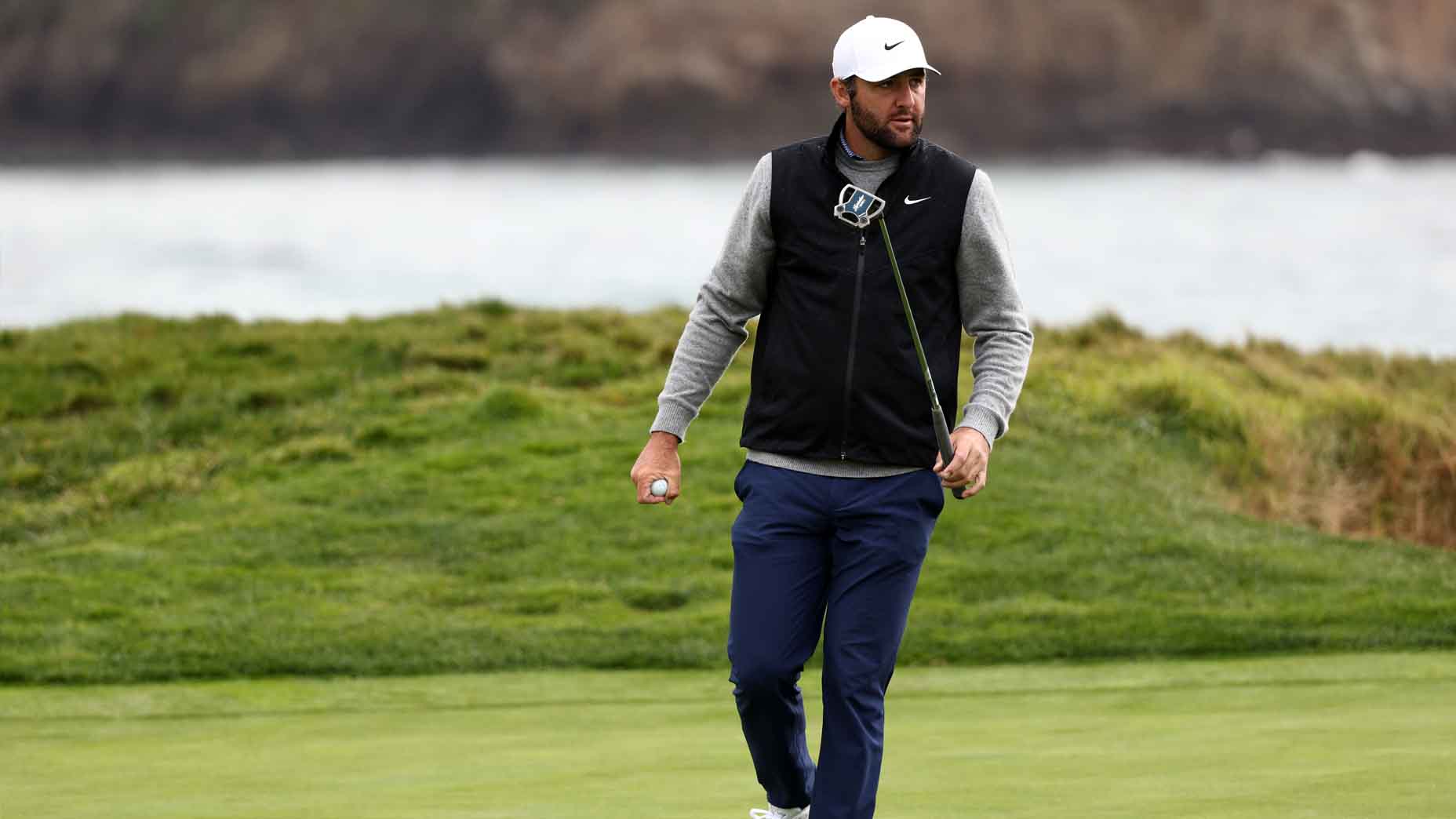 Scottie Scheffler looks on at Pebble Beach