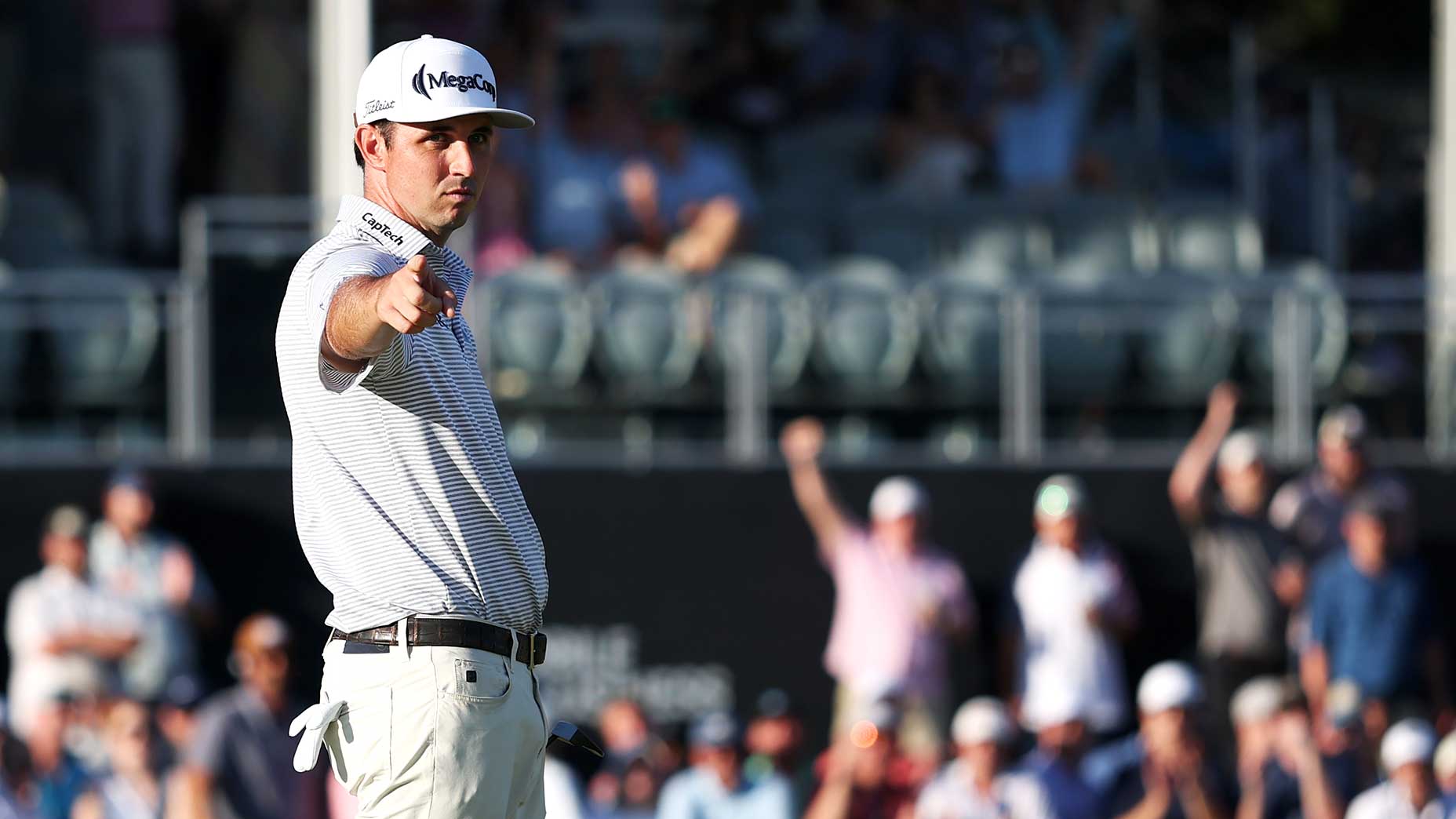 J.T. Poston reacts after making a long birdie putt to close his third round of the 2025 PGA Championship.