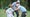 Shane Lowry, Rory McIlroy and Tommy Fleetwood of England react to Poppy McIlroy's made putt during the Masters Par 3 Contest prior to the 2025 Masters at Augusta National.