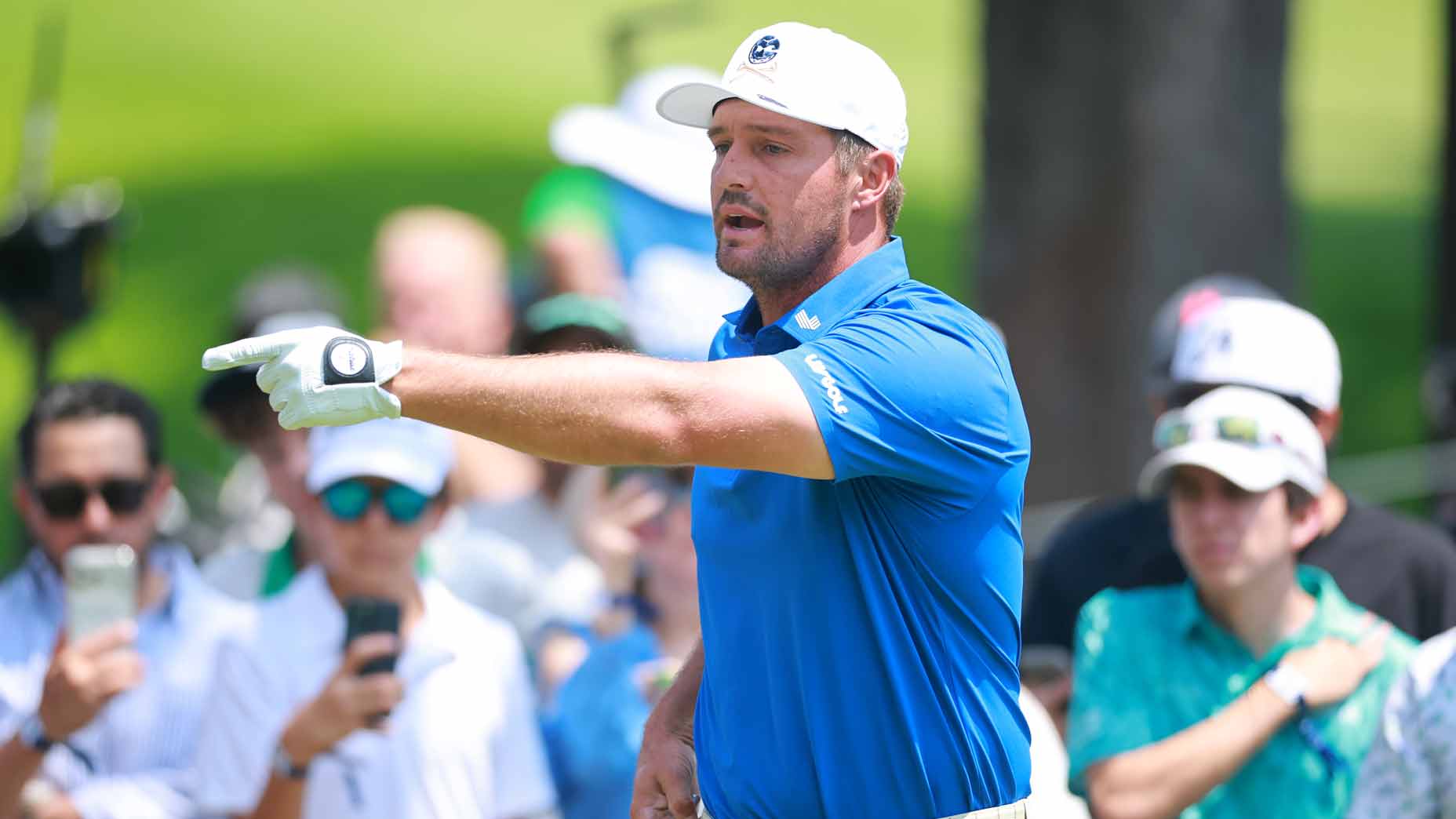 Bryson DeChambeau points during 2026 LIV Golf Mexico City event. DeChambeau is considering a PGA Tour return.