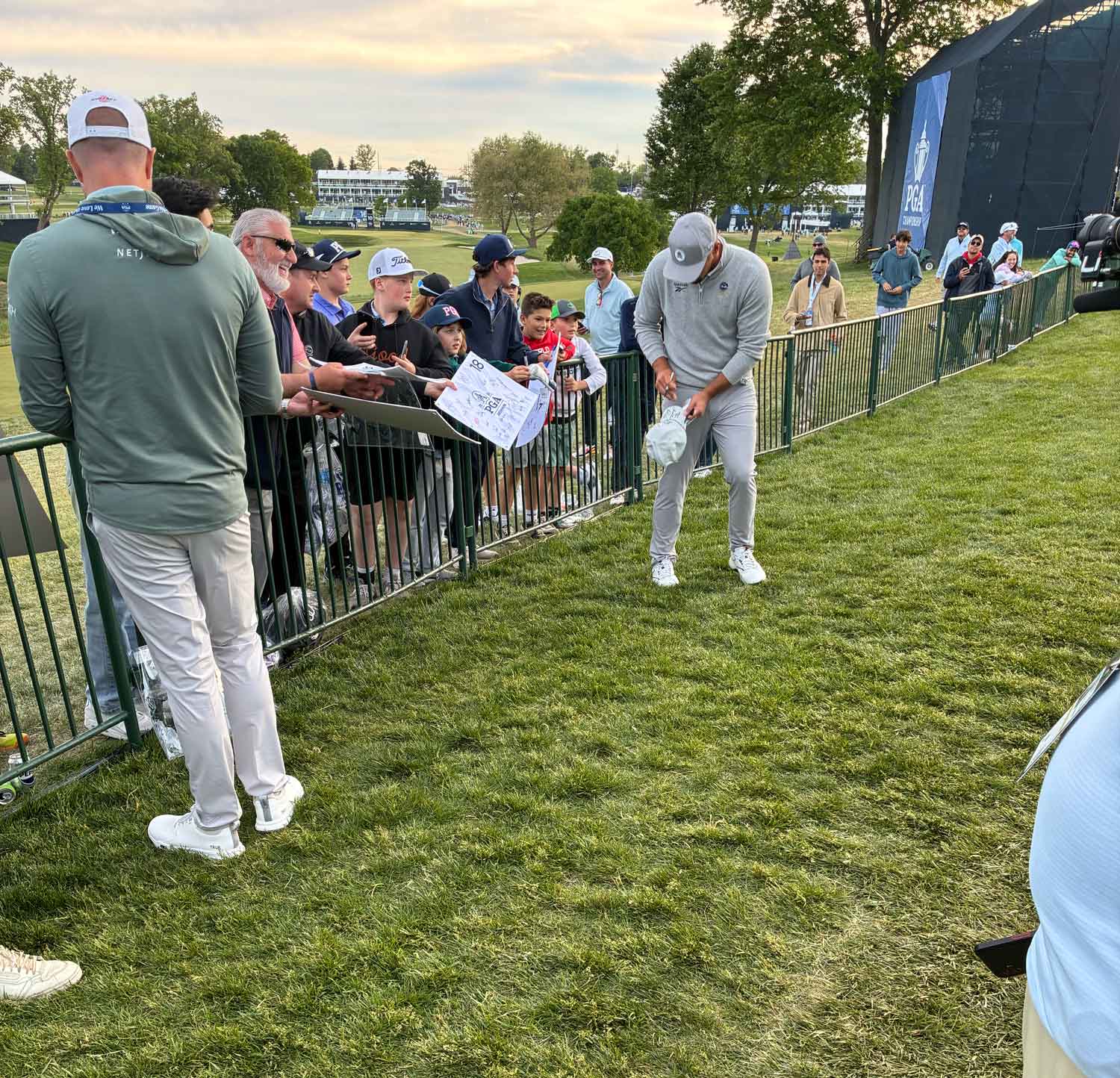 Bryson DeChambeau signing autographs