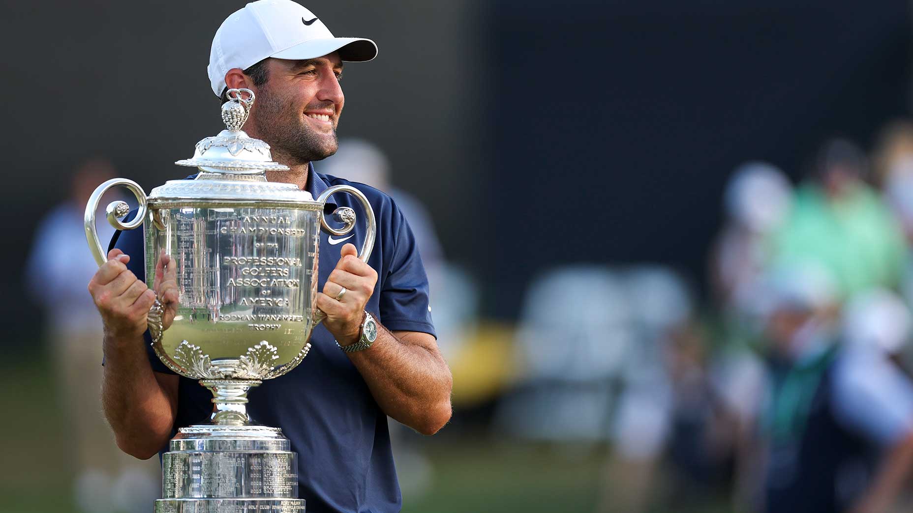 Scottie Scheffler celebrates with the Wanamaker Trophy after winning the 2025 PGA Championship at Quail Hollow