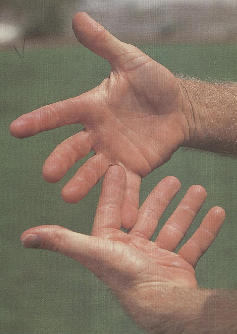 greg norman demonstrates grip