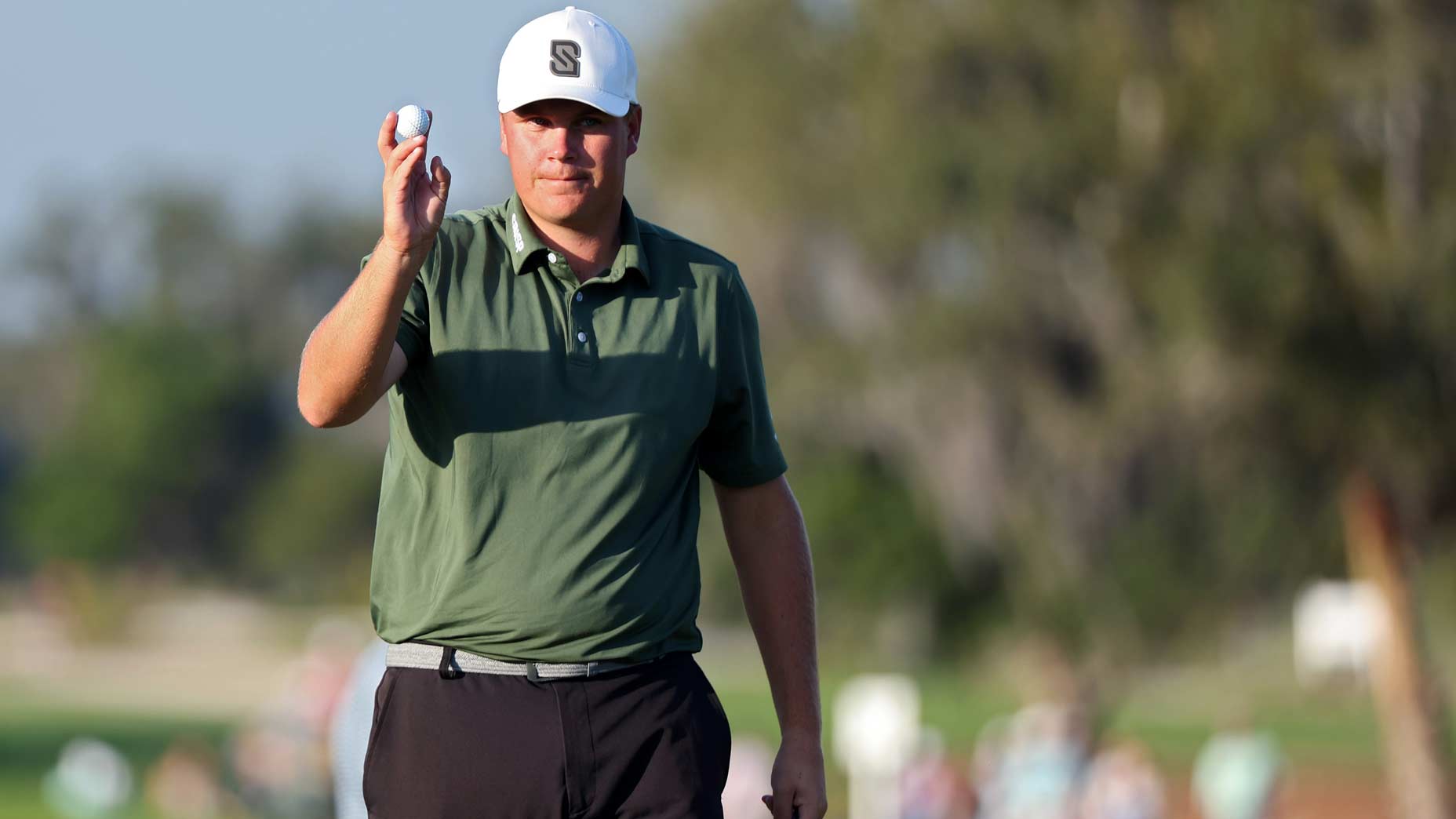 sami valimaki waves to the crowd during the 2025 rsm classic