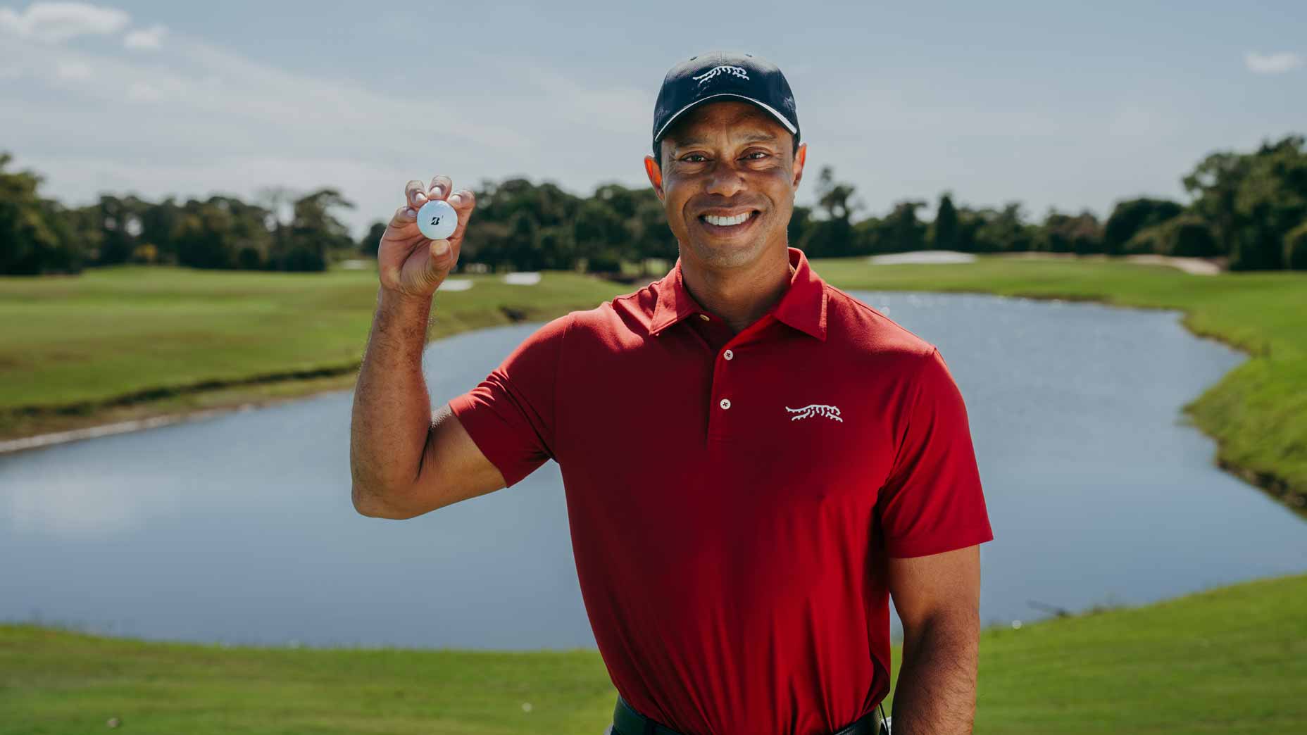Tiger Woods with the new Bridgestone Tour B golf ball.