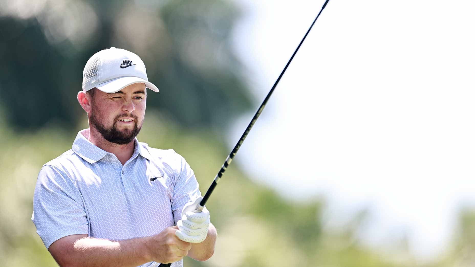 Alex Fitzpatrick lines up tee shot during the 2026 Cadillac Championship at Trump National Doral.