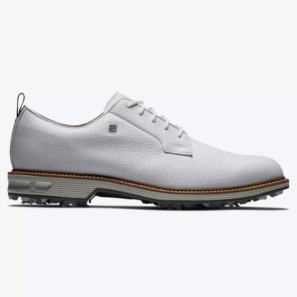 A stylish white leather golf shoe with a textured surface, brown and gray sole, and a small logo near the heel, this shoe is shown from the side on a plain background.