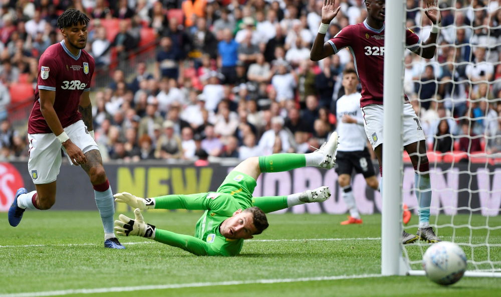 Aston Villa goalkeeper Jed Steer making a save at Wembley